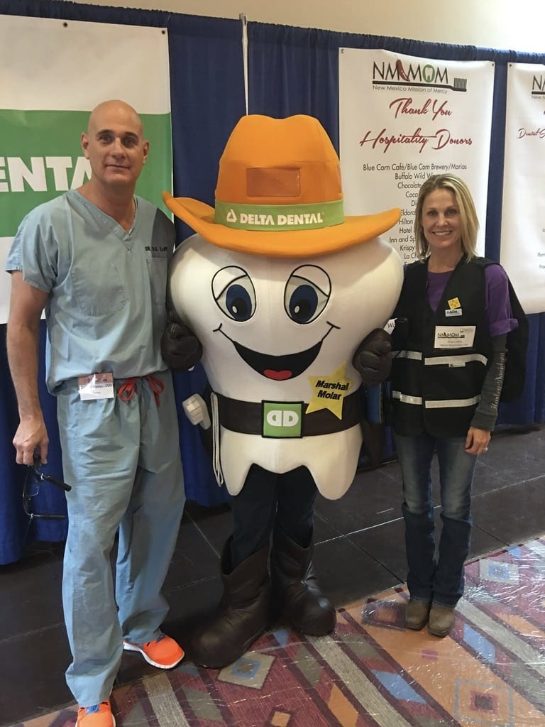 Dr. & Paige LoPour with Delta Dental Mascot