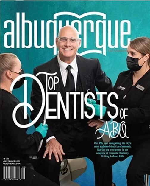 Albuquerque magazine cover featuring top dentists of ABQ with three dental professionals in formal attire.